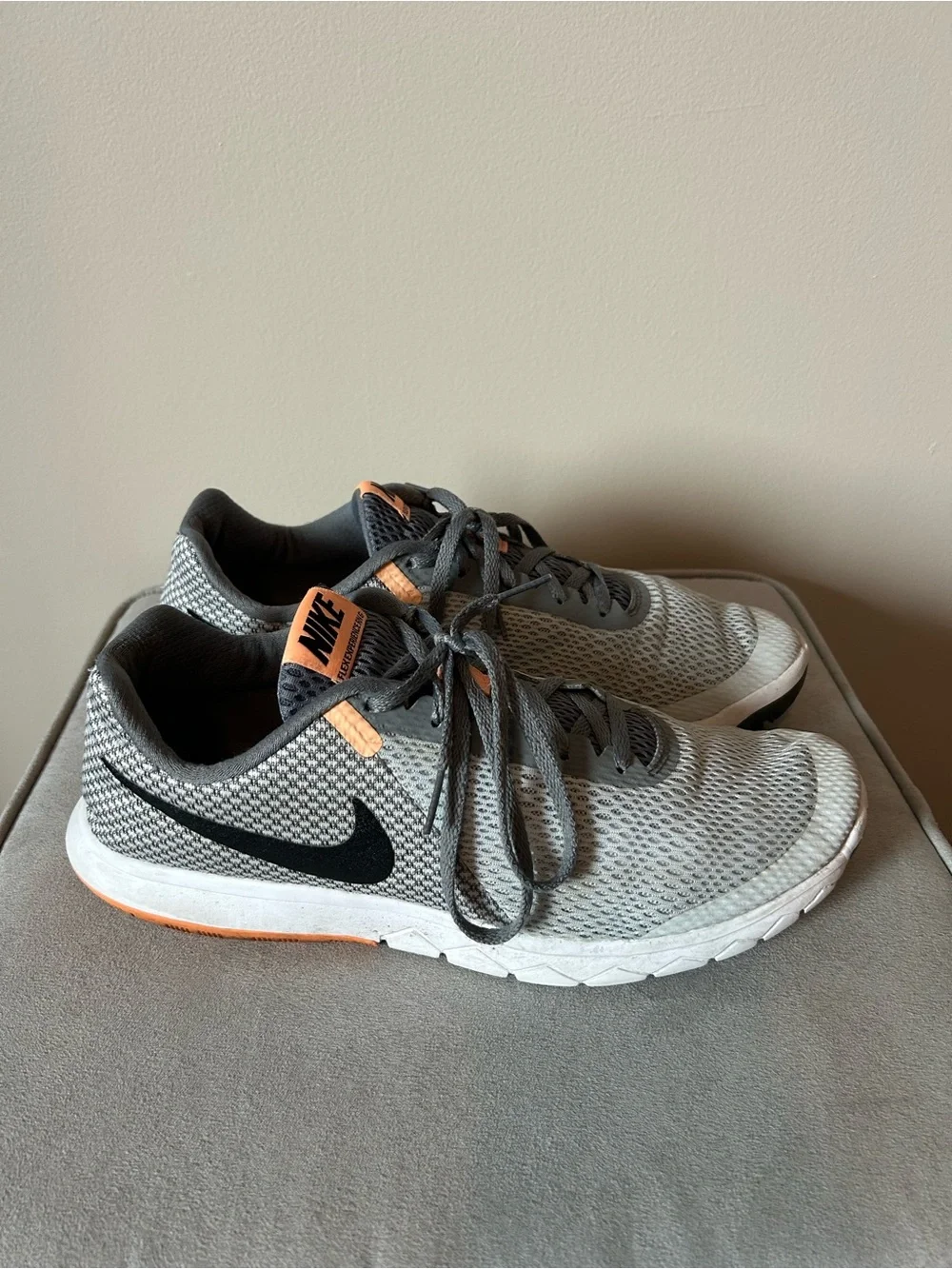 Nike women’s Gray & Black Mesh Sneakers with Orange Accents